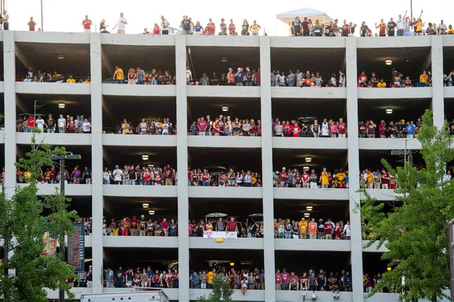 Fans fill a parking garage with in view of Quicken Loans Arena during the Cleveland Cavaliers NBA Finals Game Seven watch party on June 19, 2016 in Cleveland, Ohio. (Photo by Jason Miller/Getty Images)