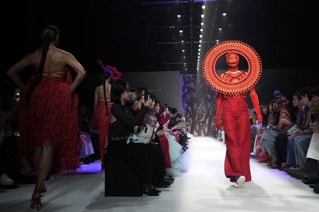 A model presents a creation as part of the Issue show, during Paragon Bangkok International Fashion Week in Thailand, Friday, October 4, 2024. (Phoot by Sakchai Lalit/AP Photo)