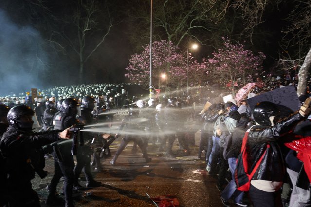 Police officers use pepper spray on demonstrators during a protest on the day Istanbul Mayor Ekrem Imamoglu was jailed as part of a corruption investigation, in Istanbul, Turkey, on March 23, 2025. (Photo by Umit Bektas/Reuters)
