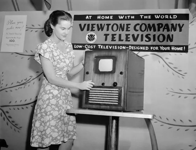 This television set, retailing for $100, is reported the first moderately priced receiver manufactured in quantity. Rose Clare Leonard watches the screen, which reproduces a 5x7 image, as she tunes in at the first public post-war showing at a New York department store, August 24, 1945. (Photo by Ed Ford/AP Photo)