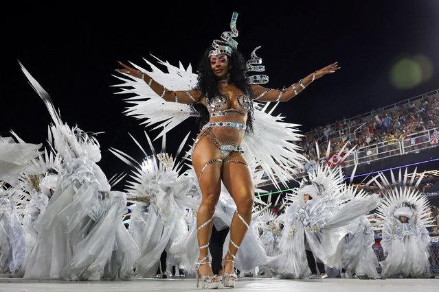 Revelers from Unidos da Tijuca samba school perform during the night of the Carnival parade at the Sambadrome, in Rio de Janeiro, Brazil, on February 12, 2024. (Photo by Ricardo Moraes/Reuters)