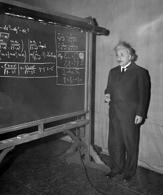 Prof. Albert Einstein uses the blackboard as he delivers the 11th Josiah Willard Gibbs lecture at the meeting of the American Association for the Advancement of Science in the auditorium of the Carnegie Institute of Technology Little Theater at Pittsburgh, Pa., on December 28, 1934. Using three symbols, for matter, energy and the speed of light respectively, Einstein offers additional proof of a theorem propounded by him in 1905 that matter and energy are the same thing in different forms. (Photo by AP Photo)