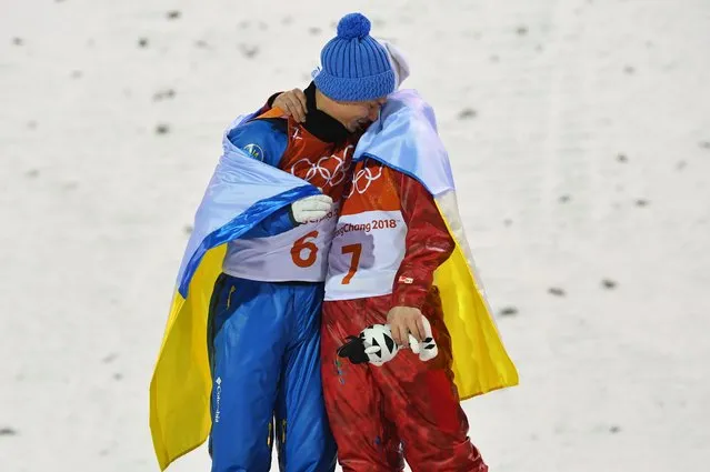 (L-R) Gold medalist Oleksandr Abramenko of the Ukraine and bronze medalist Ilia Burov of Olympic Athlete from Russia pose during the victory ceremony for the Freestyle Skiing Men's Aerials Final on day nine of the PyeongChang 2018 Winter Olympic Games at Phoenix Snow Park on February 18, 2018 in Pyeongchang-gun, South Korea. (Photo by Dylan Martinez/Reuters)