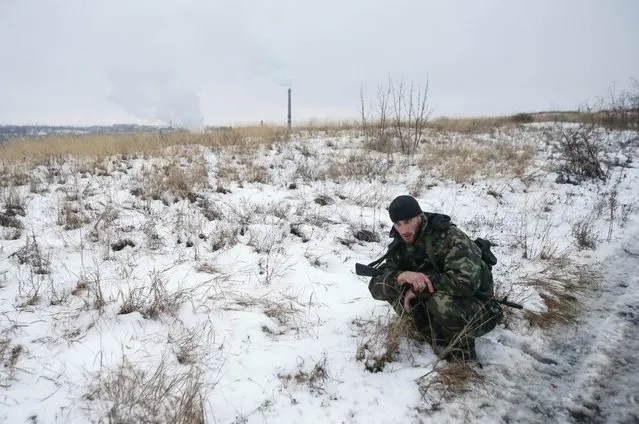 A pro-Russian separatist from the Chechen “Death” battalion takes part in a training exercise in the territory controlled by the self-proclaimed Donetsk People's Republic, eastern Ukraine, December 8, 2014. (Photo by Maxim Shemetov/Reuters)