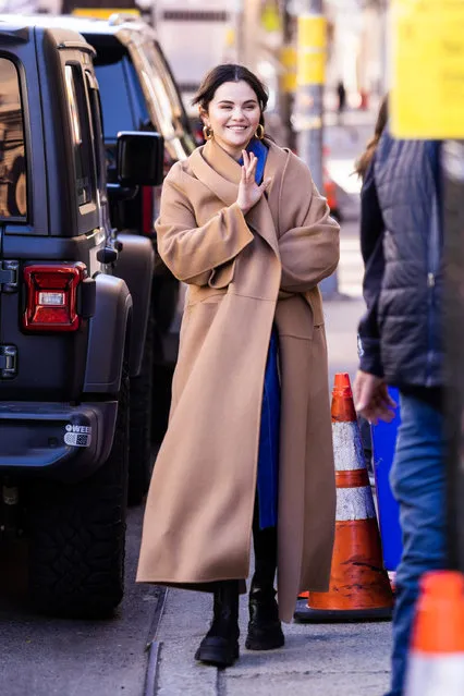 Selena Gomez is seen leaving the Only Murders in the Building set at the United Palace Theater in New York City on March 9, 2023. The pop star and actress wore a brown trench coat, with black boots. (Photo by The Image Direct)