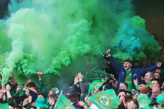 Republic of Ireland fans show their support with flares prior to the UEFA EURO 2024 qualifying round group B match between Republic of Ireland and France at Dublin Arena on March 27, 2023 in Dublin, Ireland. (Photo by Oisin Keniry/Getty Images)