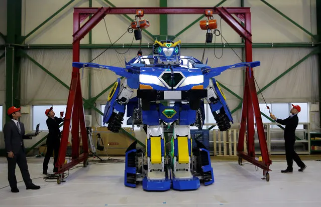 A new transforming robot called “J-deite RIDE” that transforms itself into a passenger vehicle, developed by Brave Robotics Inc, Asratec Corp and Sansei Technologies Inc, is unveiled at a factory near Tokyo, Japan on April 26, 2018. (Photo by Toru Hanai/Reuters)