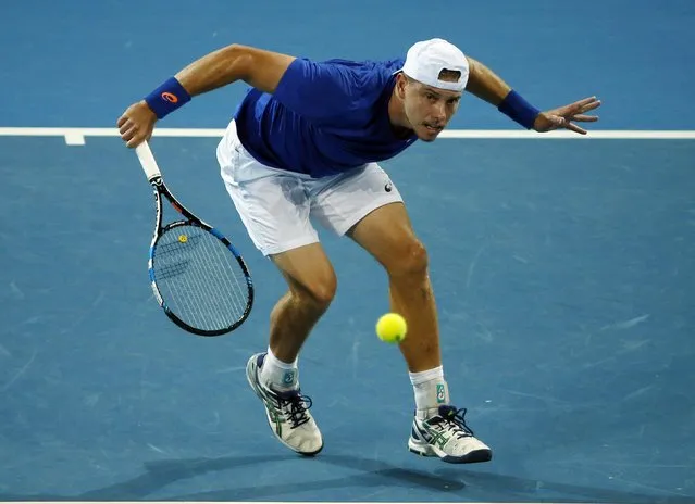 James Duckworth of Australia plays a return to Roger Federer of Switzerland during their men's singles quarter-final match at the Brisbane International tennis tournament in Brisbane, January 9, 2015. (Photo by Jason Reed/Reuters)
