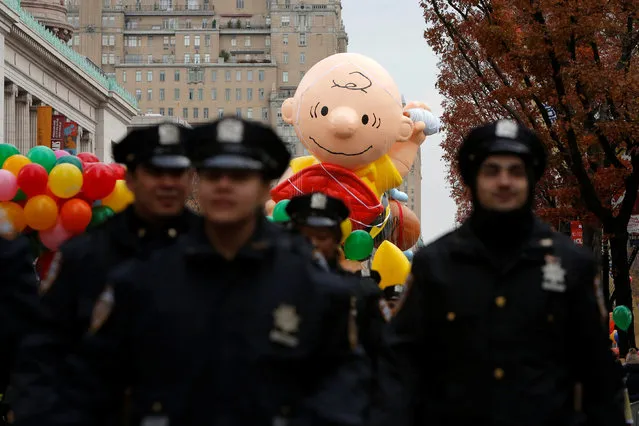 Members of the New York Police Department walk the parade route before the 90th Macy's Thanksgiving Day Parade in Manhattan, New York, U.S., November 24, 2016. (Photo by Andrew Kelly/Reuters)