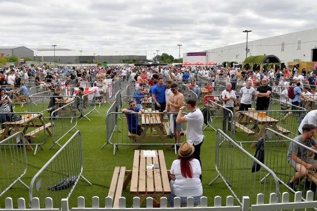 Fans celebrate at the final whistle at the 4TheFans fan zone at Event City on June 13, 2021 in Manchester, England. Fanzones and pubs are hosting England fans around the country as England take on Croatia at Wembley in the first game of Euro 2020. (Photo by Anthony Devlin/Getty Images)