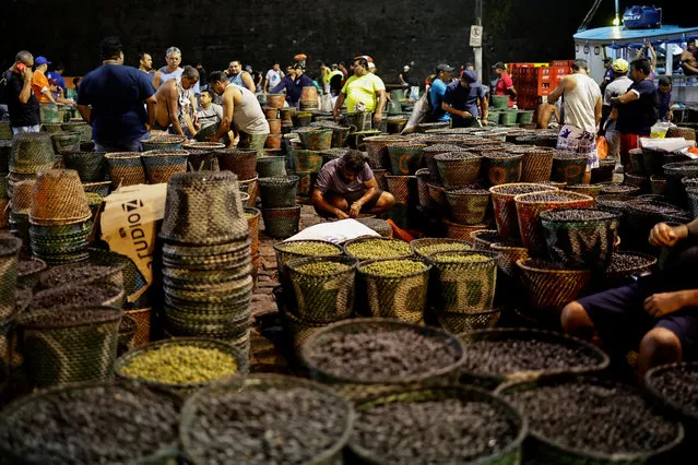 Vendors sell acai berries at the Ver-o-Peso market, ahead of the summit of Amazon rainforest nations in Belem, Para state, Brazil on August 7, 2023. (Photo by Ueslei Marcelino/Reuters)