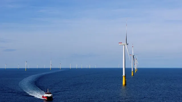 DENMARK: A boat sails past DanTysk wind farm, 90 kilometres west of Esbjerg, Denmark, September 21, 2016. (Photo by Nikolaj Skydsgaard/Reuters)