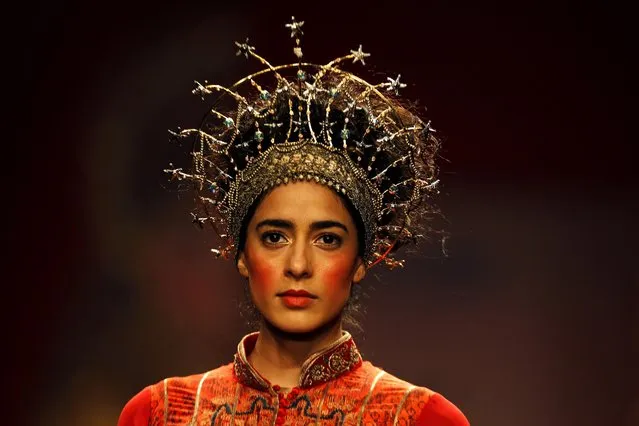 A model displays a creation by JJ Valaya during the Amazon India Fashion Week in New Delhi, India, Wednesday, March 25, 2015. (Photo by Altaf Qadri/AP Photo)
