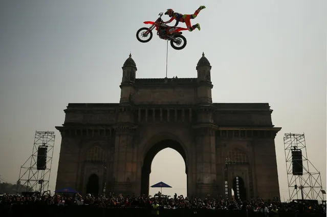 Alexey Kolesnikov of Russia performs during the freestyle motocross games Red Bull FMX Jam at the Gateway of India monument in Mumbai, India, February 2, 2019. (Photo by Francis Mascarenhas/Reuters)