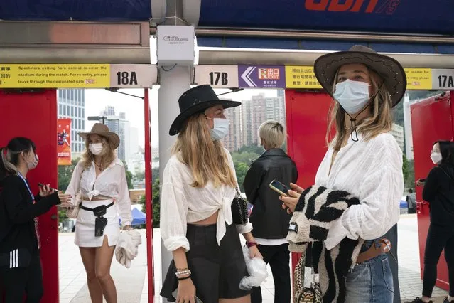 Spectators arrive at the Hong Kong Stadium ahead of the first day of the Hong Kong Sevens rugby tournament in Hong Kong, Friday, November 4, 2022. (Photo by Anthony Kwan/AP Photo)