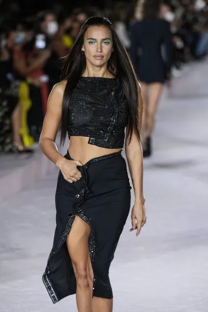 Irina Shayk wears a creation for the Versace Spring Summer 2022 collection during Milan Fashion Week, in Milan, Italy, Friday, September 24, 2021. (Photo by Luca Bruno/AP Photo)