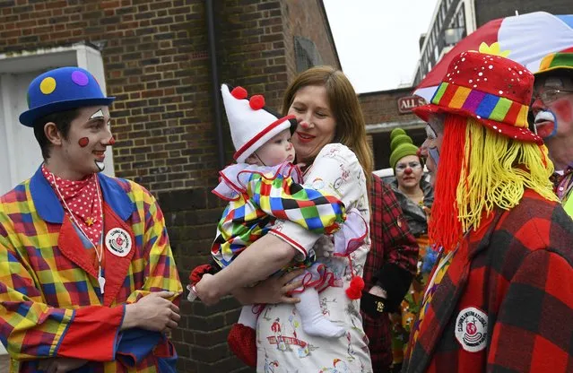 Clowns and entertainers gather to attend an annual service of remembrance in honour of British clown Joseph Grimaldi at All Saints Church in Haggerston in London, Britain, February 5, 2017. (Photo by Toby Melville/Reuters)
