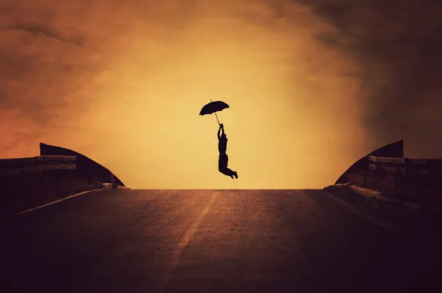 Flying With Umbrella By Adrian Limani