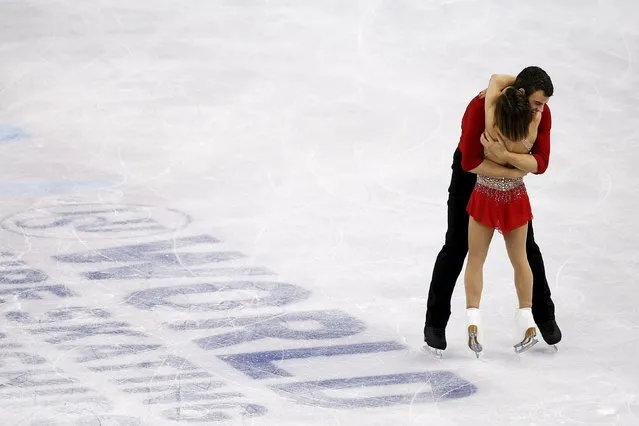 Figure Skating, ISU World Figure Skating Championships, Ice Dance Free Dance, Boston, Massachusetts, United States on March 31, 2016: Meagan Duhamel and Eric Radford of Canada react after competing. (Photo by Brian Snyder/Reuters)