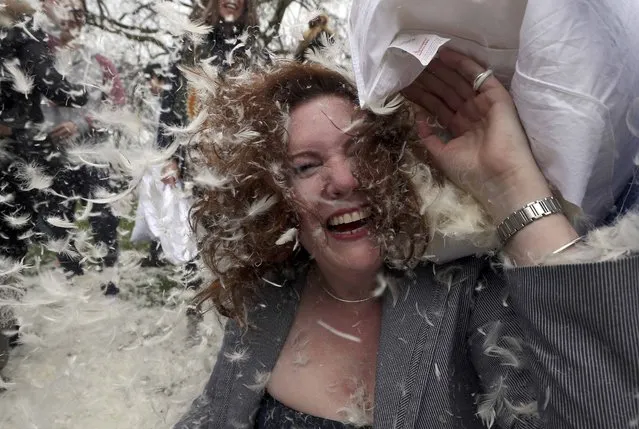 Participants take part in International Pillow Fight Day in Kennington Park in south London, Britain April 2, 2016. (Photo by Neil Hall/Reuters)