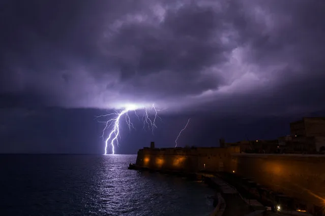 A lightning bolt strikes the sea near Fort St Elmo during a storm in Valletta, Malta on February 27, 2019. (Photo by Darrin Zammit Lupi/Reuters)