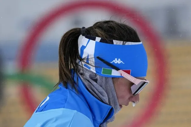 Ice forms on the nose of a skier from Italy during a cross-country skiing training session before the 2022 Winter Olympics, Friday, February 4, 2022, in Zhangjiakou, China. (Photo by Aaron Favila/AP Photo)