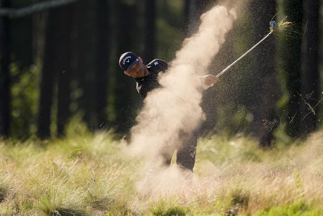 Xander Schauffele hits from the native area on the 11th hole during the second round of the U.S. Open golf tournament Friday, June 14, 2024, in Pinehurst, N.C. (Photo by George Walker IV/AP Photo)