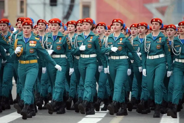 Female soldiers march in formation in St Petersburg' s Palace Square during a rehearsal of a Victory Day military parade marking the 72 nd anniversary of the victory over Nazi Germany in the 1941-1945 Great Patriotic War, the Eastern Front of World War II. (Photo by Peter Kovalev/TASS)