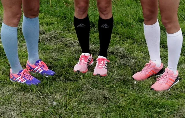 Estonia's olympic team female marathon runners triplets (L-R) Leila, Liina and Lily Luik wear socks in Estonia's national colours during a training session in Tartu, Estonia, May 26, 2016. (Photo by Ints Kalnins/Reuters)