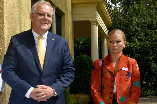 Prime Minister Scott Morrison and 2021 Australian of the Year Grace Tame during a morning tea for state and territory recipients in the 2022 Australian of the Year Awards at The Lodge in Canberra, Tuesday, January 25, 2022. (Photo by Mick Tsikas/AAP Image)