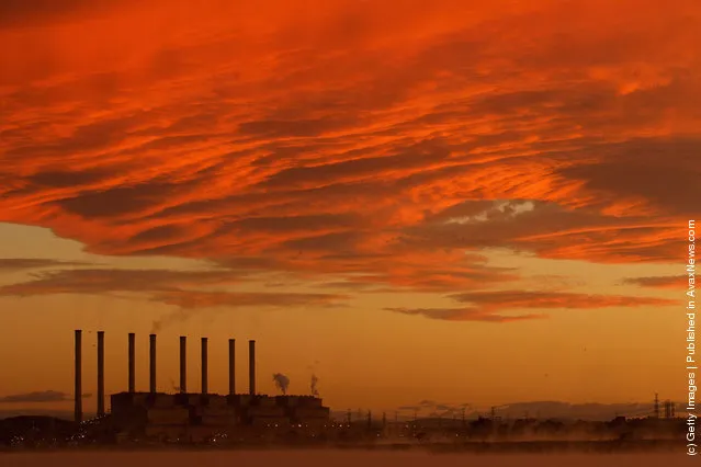 A view of the Hazelwood Power Station across the cooling pondage at sunrise in Melbourne, Australia