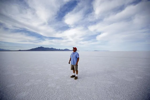 In this Monday, July 20, 2015 photo, Bill Lattin, the Southern California Timing Association president and Speed Week race director, stands in the Bonneville Salt Flats in Utah. (Photo by Rick Bowmer/AP Photo)