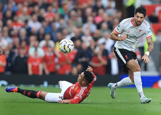 Liverpool's Dominik Szoboszlai battles for possession of the ball with Manchester United's Casemiro during the Premier League match at Old Trafford, Manchester on Sunday, September 1, 2024. (Photo by Matt West/Rex Features/Shutterstock)