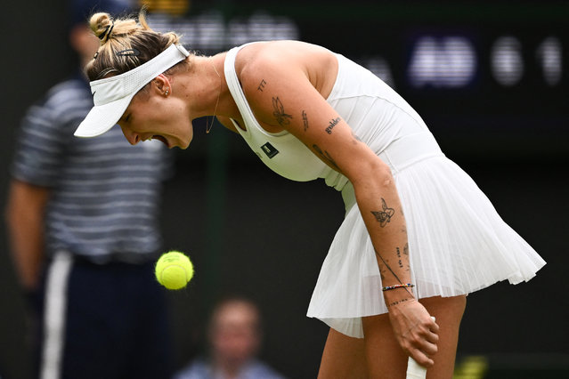 Czech Republic's Marketa Vondrousova reacts as she plays against Ukraine's Elina Svitolina during their women's singles semi-finals tennis match on the eleventh day of the 2023 Wimbledon Championships at The All England Lawn Tennis Club in Wimbledon, southwest London, on July 13, 2023. (Photo by Sebastien Bozon/AFP Photo)