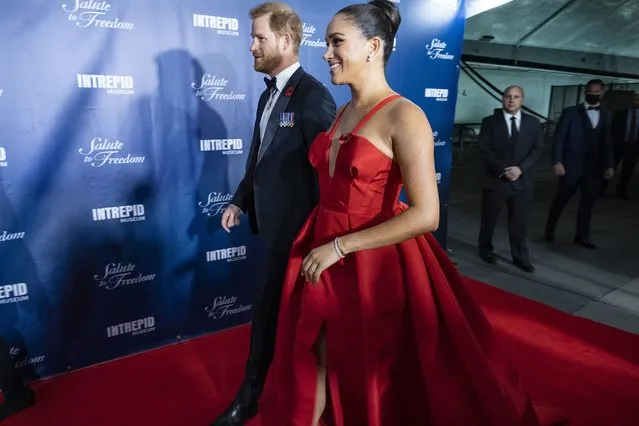 Prince Harry and Meghan Markle, Duke and Duchess of Sussex, arrive at the Intrepid Sea, Air & Space Museum for the Salute to Freedom Gala Wednesday, November 10, 2021, in New York. The Duchess of Sussex has apologized for misleading a British court about the extent of her cooperation with the authors of a sympathetic book about her and Prince Harry. The former Meghan Markle sued a U.K. newspaper for publishing a letter she wrote to her estranged father, Thomas Markle. (Photo by Craig Ruttle/AP Photo)