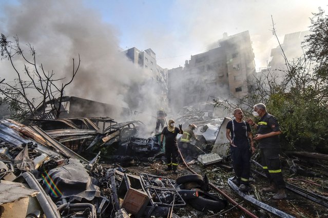 Firefighters extinguish the blaze at the site of overnight Israeli airstrikes that target the neighborhood of Kafaat in Beirut's southern suburbs on November 1, 2024. Lebanon's prime minister accuses Israel of rejecting a ceasefire after the Israeli military bombs the Hezbollah stronghold of south Beirut for the first time this week on November 1. (Photo by Fadel Itani/NurPhoto/Rex Features/Shutterstock)