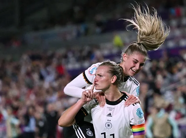 Alexandra Popp of Germany celebrates after scoring their team's second goal during the UEFA Women's Euro 2022 Quarter Final match between Germany and Austria at Brentford Community Stadium on July 21, 2022 in Brentford, England. (Photo by Dylan Martinez/Reuters)