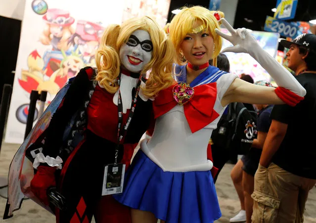 Attendees dressed as Harley Quinn (L) and Sailor Moon pose for a picture at the pop culture event Comic-Con International in San Diego, California, United States July 22, 2016. (Photo by Mike Blake/Reuters)