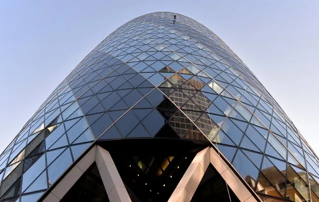 Rupert Atkin, CEO Talbot Underwriting abseils down the Gherkin during the Outward Bound Trust's and the Royal Navy and Royal Marines Charity's most daring stunt: The City Three Peaks Challenge on September 7, 2015 in London, England. (Photo by Anthony Harvey/Getty Images for the Outward Bound Trust and the Royal Navy and Royal Marines Charity)