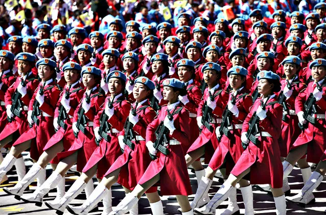 In this photo released by China's Xinhua News Agency, a female militia phalanx attends a grand ceremony marking the 50th anniversary of the founding of the Tibet Autonomous Region at the square of the Potala Palace in Lhasa, capital of southwest China's Tibet Autonomous Region, Tuesday, September 8, 2015. (Photo by Pang Xinglei/Xinhua via AP Photo)