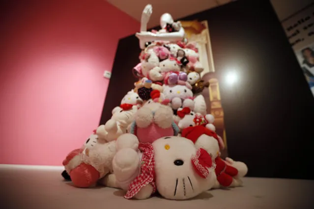 A dress made by GK Reid and with Hello Kitties is displayed at the “Hello! Exploring the Supercute World of Hello Kitty” museum exhibit in honor of Hello Kitty's 40th anniversary, at the Japanese American National Museum in Los Angeles, California October 10, 2014. (Photo by Lucy Nicholson/Reuters)