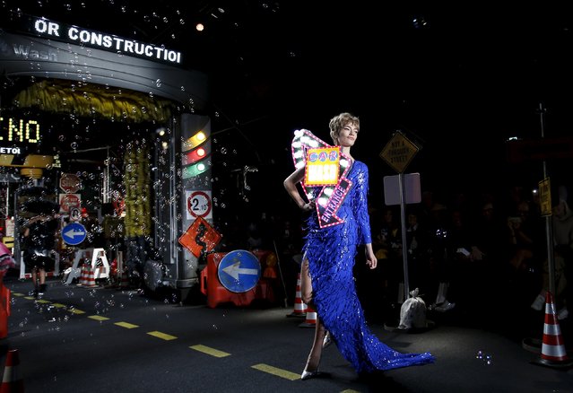 A model presents a creation from the Moschino Spring/Summer 2016 collection during Milan Fashion Week in Italy, September 24, 2015. (Photo by Alessandro Garofalo/Reuters)