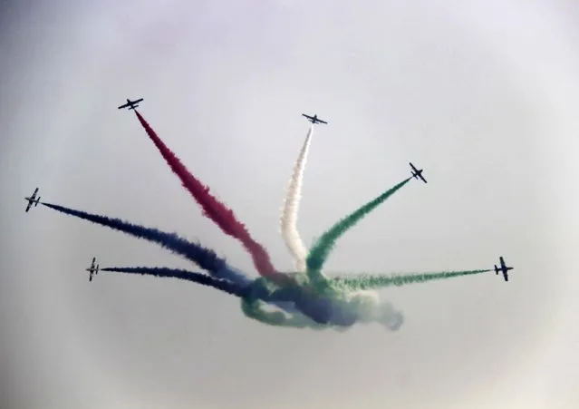 The UAE “The Knights” aerobatics team perform during the 10th China International Aviation and Aerospace Exhibition in Zhuhai, Guangdong province November 14, 2014. (Photo by Reuters/China Daily)