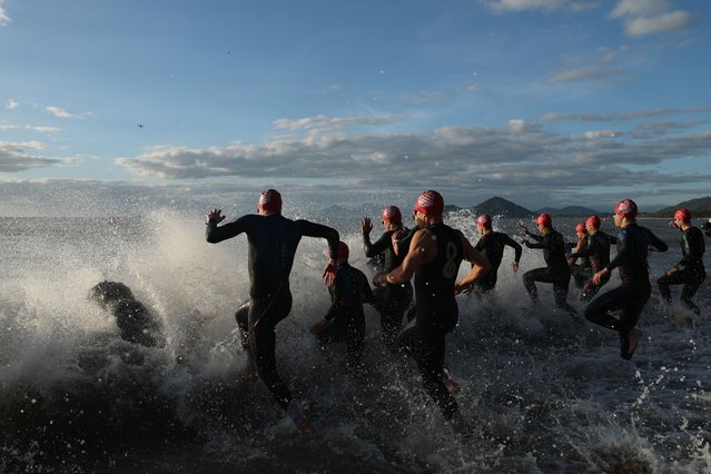 Athletes compete in the swim leg of the Men’s Pro Series race during the 2025 IRONMAN Cairns on June 15, 2025 in Cairns, Australia. (Photo by Cameron Spencer/Getty Images for IRONMAN)
