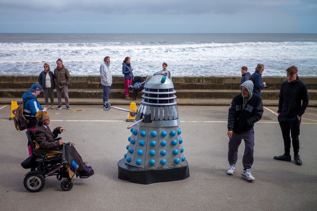 A Dalek interacts with members of the public on day one of the Scarborough Sci Fi weekend on April 20, 2024 in Scarborough, England. The North Yorkshire seaside town hosts the event at the Scarborough Spa complex and showcases many areas of Sci-Fi fandom to entertain visitors and enthusiasts including guest star appearances, panel discussions, gaming, cosplay, props, comic books and merchandise stalls with many of those attending wearing costumes and outfits of their favourite Sci-Fi characters. (Photo by Ian Forsyth/Getty Images)