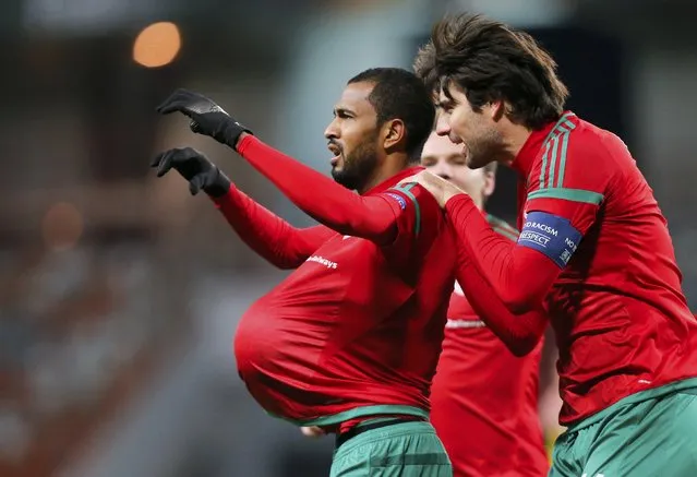 Lokomotiv Moscow's Maicon (L) celebrates with team mate Vedran Corluka (R, front) after scoring a goal during the Europa League group H soccer match against Besiktas in Moscow, Russia, October 22, 2015. (Photo by Maxim Zmeyev/Reuters)