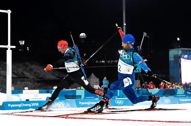 Simon Schempp of Germany and Martin Fourcade of France at the finish line (Fourcade won) during the Biathlon Men's 15km Mass Start on day nine of the PyeongChang 2018 Winter Olympic Games at Alpensia Biathlon Centre on February 18, 2018 in Pyeongchang, South Korea. (Photo by Toby Melville/Reuters)