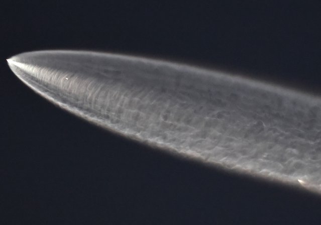A SpaceX Falcon 9 rocket rises after launching from Vandenberg Space Force Base carrying 28 Starlink internet satellites on September 28, 2025 as seen from Altadena, California. More than 8,000 Starlink satellites have been launched into low Earth orbit with the company planning to orbit up to 12,000 overall. (Photo by Mario Tama/Getty Images)