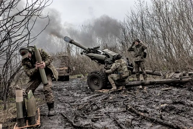 Ukrainian soldiers of Da Vinci Wolves Battalion firing artillery in the direction of Bakhmut, 3 April 2023. (Photo by Diego Herrera Carcedo/Anadolu Agency via Getty Images)