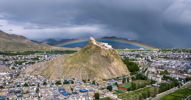 Aerial view of rainbow appearing over Jiangzi Zongshan Castle on July 1, 2025 in Shigatse, Xizang Autonomous Region of China. (Photo by VCG/VCG via Getty Images)